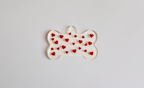 Chapa identificativa de corazones